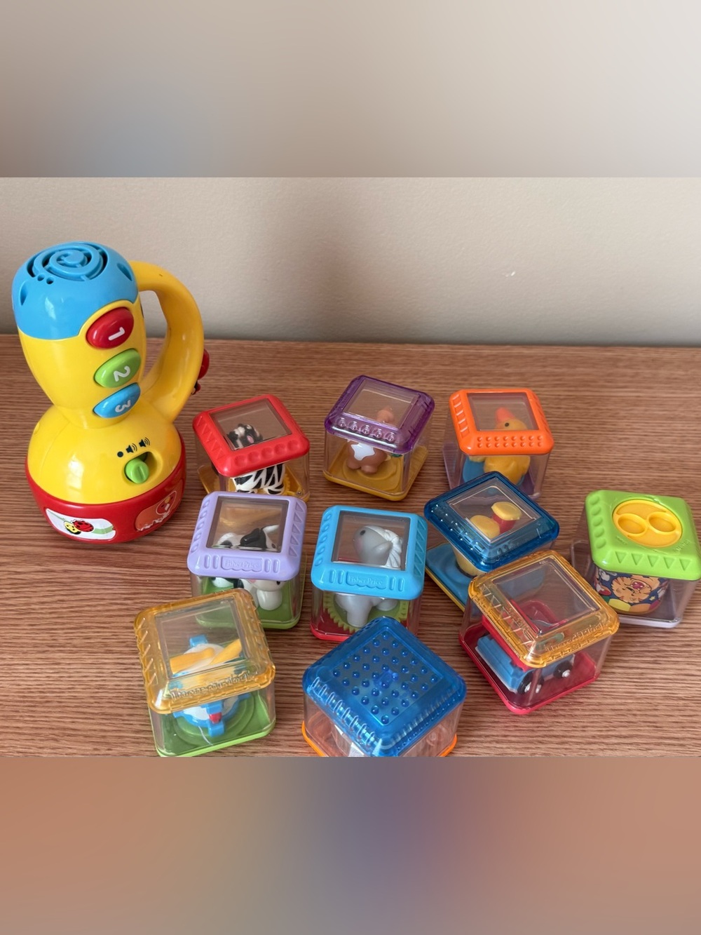 Fisher-Price Peek-a-Blocks and VTech Spin & Learn Color Flashlight